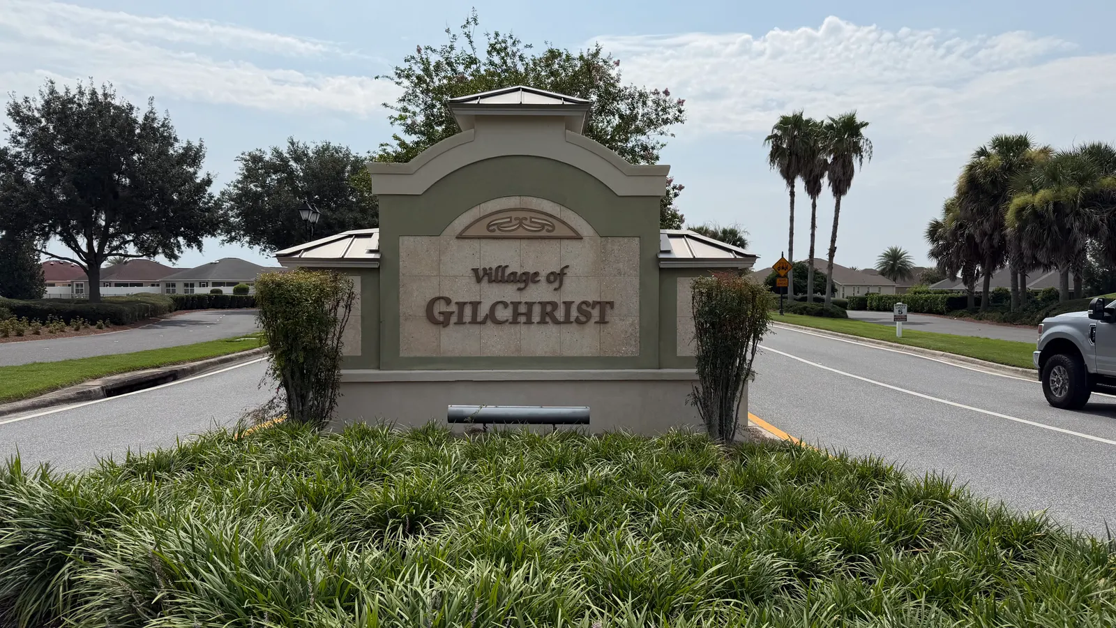 Village of Gilchrist entrance sign in The Villages, FL
